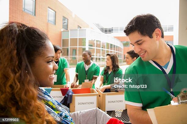 Volunteers College Students Collect Clothing Donations Stock Photo - Download Image Now
