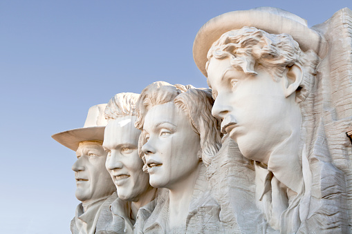 Pigeon Forge, Tennessee, USA - January 7, 2014: The Hollywood Wax Museum is a unique landmark and major tourist attraction in Pigeon Forge, Tennessee. The fasade of the building has John Wayne, Elvis Presley, Marilyn Monroe, and Charlie Chaplin carved in its own version of Mount Rushmore (shown) and a New York skyline with King Kong holding a biplane (not in the picture).