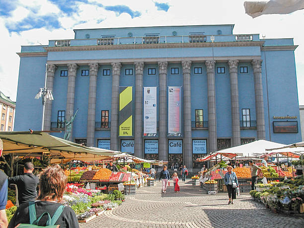 Stockholm, Sweden - August 10, 2005: People at the marketplace in front of the Konserthuset (Concert Hall)