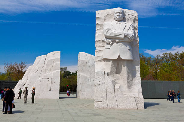 Martin Luther King Jr. Memorial, Washington DC. Clear blue sky. Washington DC, USA - March 28, 2012: Martin Luther King, Jr. Memorial. It is located in West Potomac Park in Washington, D.C., southwest of the National Mall.  Sculptor: Lei Yixin. Material: Granite. Opening date: October 16, 2011. Tourists are walking around and enjoying the monument. washington dc photos stock pictures, royalty-free photos & images