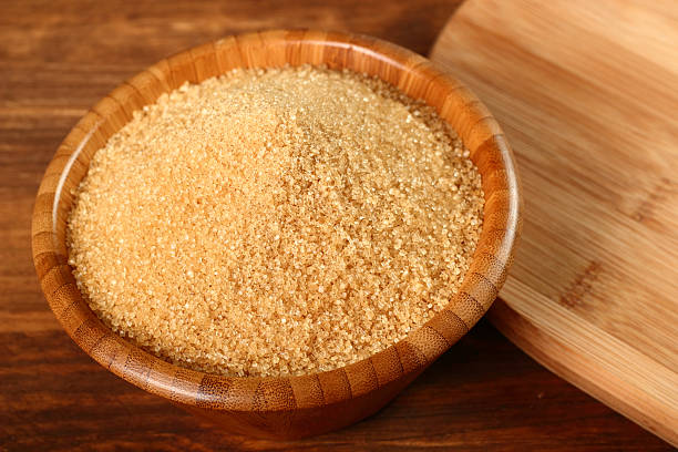 istock Cane Sugar in wooden bowl 472121717