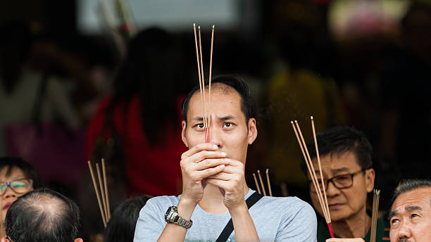 incense burn with smock with food for worship at outside home