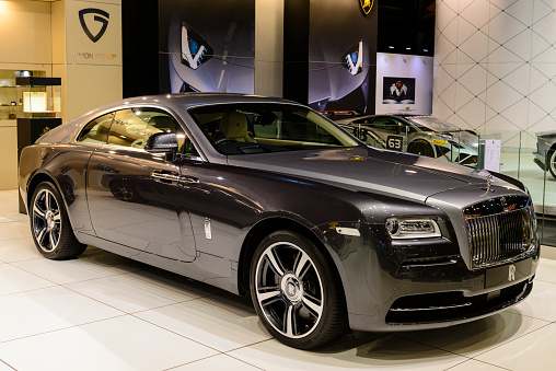 Brussels, Belgium - January 14, 2014: Two tone Rolls Royce Wraith coupe on display at the 2014 Brussels motor show. The Wraith is a four-seat coupÃ© based on the chassis of the Rolls-Royce Ghost,