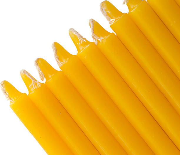 istock set of yellow wax candles 472123462