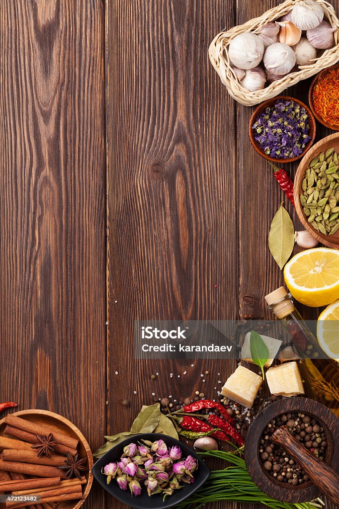 Various spices on wooden background Various spices on wooden background. Top view with copy space 2015 Stock Photo