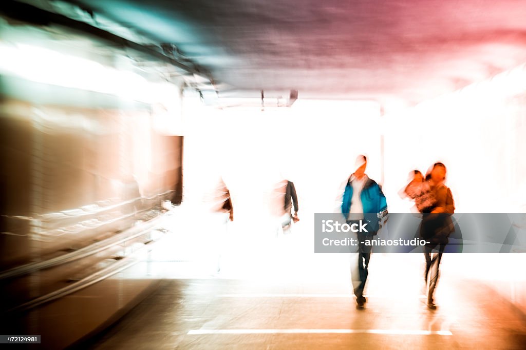 People walking People walking activity indoors, motion blurred. Abstract Stock Photo