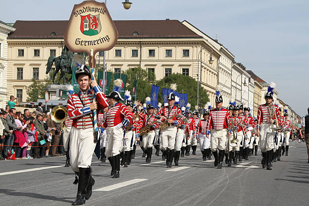 Munich, Germany  - September 22, 2013: Munich, on the float of the grand pararde in ludwigstraße the city musicians of Germering. Faithfully reproduced gala uniform of the \