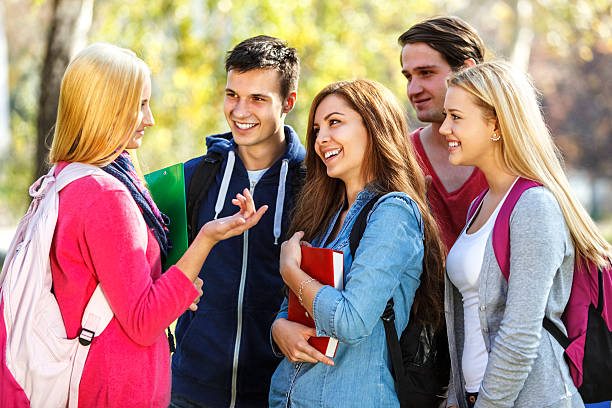 istock Friendly college students outdoors 472127065