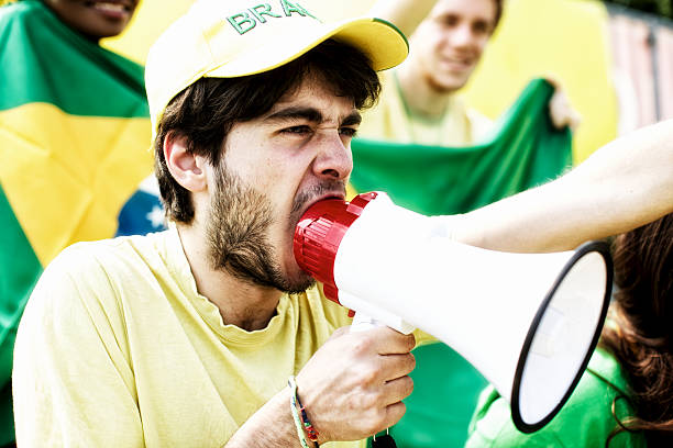 istock Sport fans cheering a game 472130365