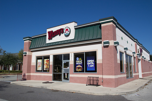 Jacksonville, FL, USA - November 28, 2013: A Wendy's fast food store in Jacksonville. Wendy's is the world's third largest hamburger fast food chain with approximately 6,650 locations. 