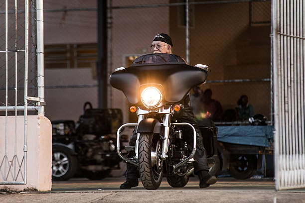 Rio das Flores (Rio de Janeiro), Brazil - April 12, 2013: Biker at the motorcycle meeting in Rio das Flores. The Motorcycle Rio das Flores is annual meeting and event which brings bikers from various regions of Brazil to the small town of Rio das Flores, in the state of Rio de Janeiro.