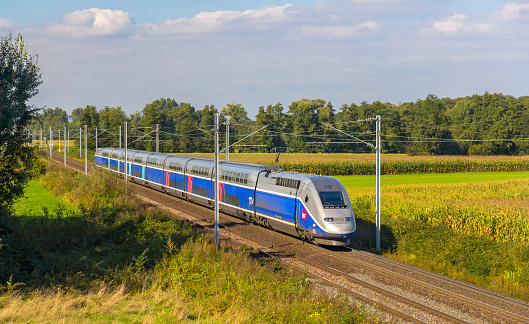 Strasbourg, France - September 22, 2013: SNCF TGV Euroduplex train on a way from Strasbourg to Paris on September 22, 2013 in Strasbourg, France. The second phase of high-speed railway between Strasbourg and Paris \