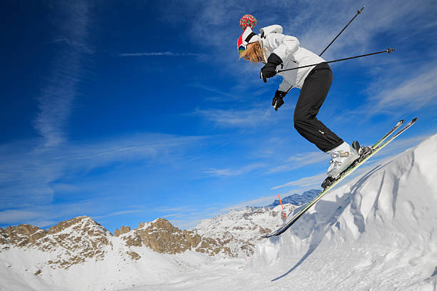 istock Alpine skier in a jump 472138141
