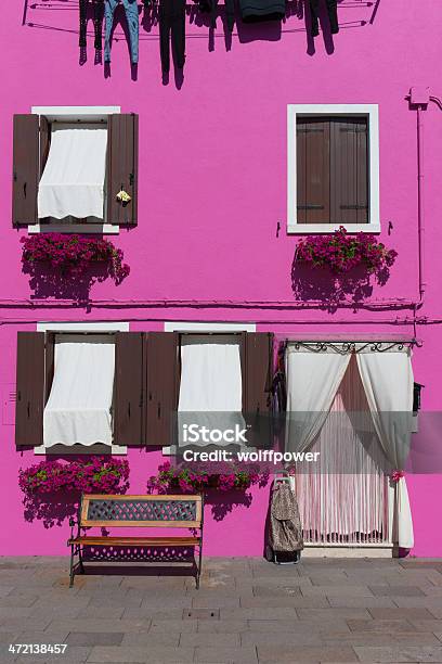 Pink Burano House With Washing And Bench Venice Italy Stock Photo - Download Image Now