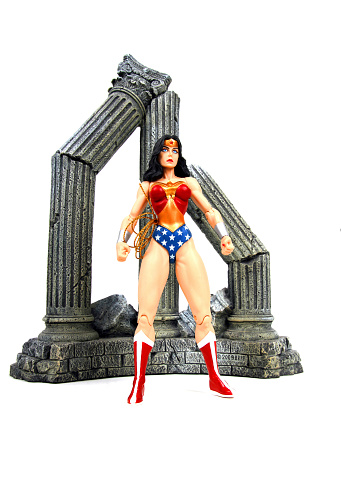 Vancouver, Canada - December 15, 2013: Action figure model of Wonder Woman, released by DC comics, against a black background.