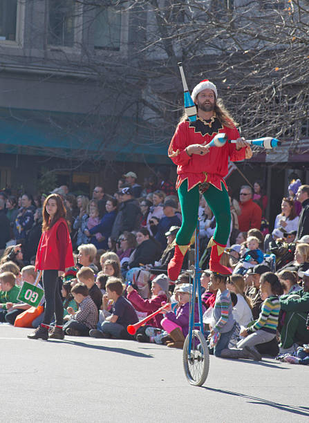 Christmas Parade Juggler on a Unicycle stock photo