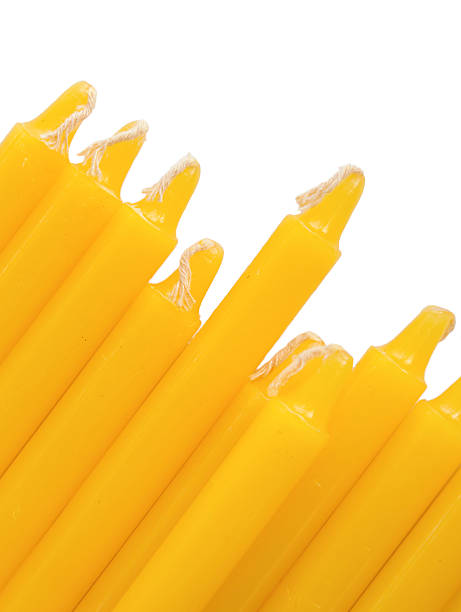 istock set of yellow wax candles 472141574