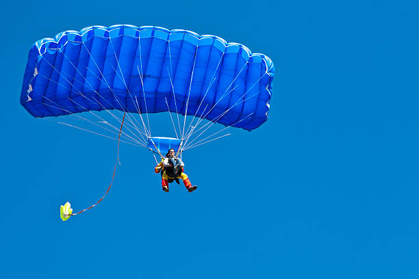 Tandem Skydivers stock photo