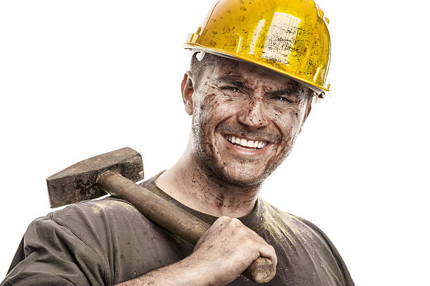istock Young dirty Worker Man With Hard Hat helmet 472141996