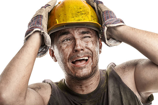 istock Young dirty Worker Man With Hard Hat helmet 472142066