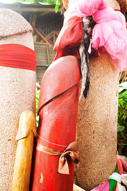 istock Red wooden and stony phallus 472142581