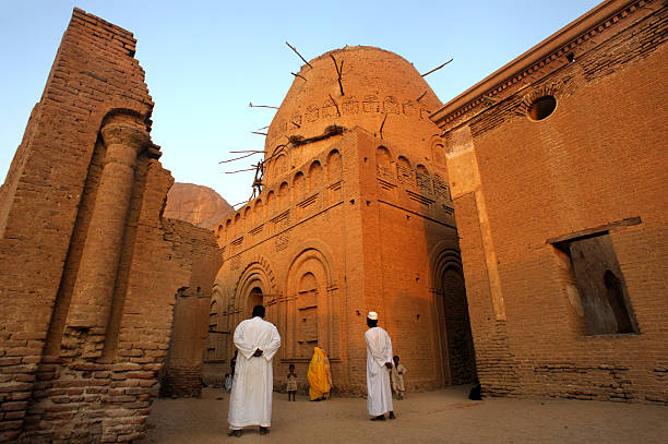 Men standing in front of Kassala mosque, Sudan stock photo