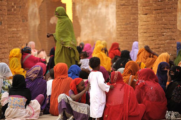 Colorful women during prayer in mosque, Kassala, Sudan stock photo