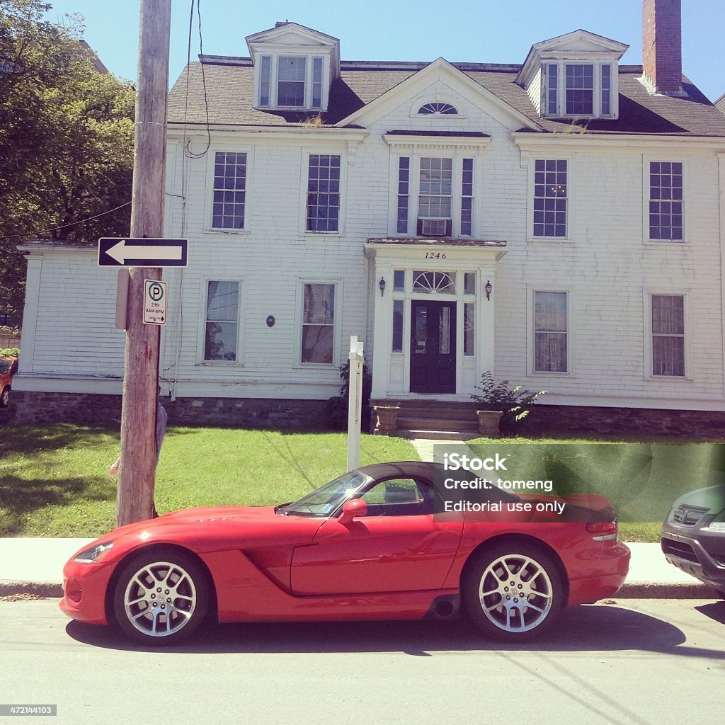 Dodge Viper SRT-10 Halifax, Nova Scotia, Canada - August 15, 2013: A 2003 Dodge Viper SRT-10 parked on Hollis Street in Halifax, Nova Scotia.  Side profile of vehicle with convertible top in upright and closed position.  This 2003 Viper is the third generation Viper featuring 500 HP and 525 lb-ft of torque.  It is available in both a convertible and coupe form. Dodge Viper Stock Photo