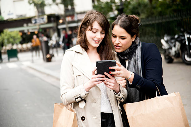 istock shopping girls on paris streets 472144173