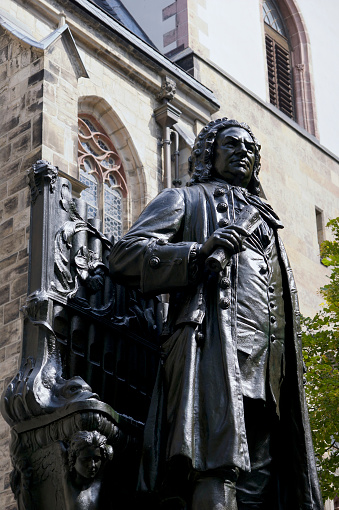 Leipzig, Germany - August 13, 2009: Statue of Johann Sebastian Bach by Carl Seffner (1908).  The statue stands outside St Thomas church in Leipzig.  Bach is buried in this church