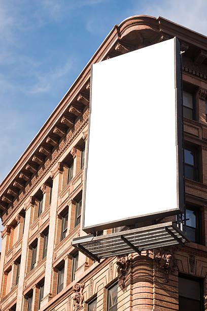 istock A white billboard attached to a corner of building in Soho 472144938