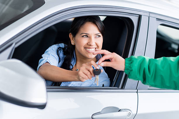 istock Woman at the gas station 472147183