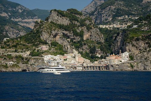 Atrani, Italy - August 22, 2013: Luxury yatch in front of Atrani village (Amalfitan coastline)