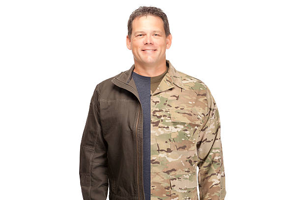 istock U.S. Army Soldier, Sergeant. Isolated. Hand up for oath. 472147504