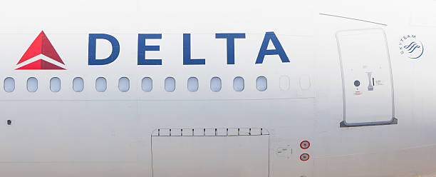 Amsterdam, the Netherlands - 6 September 2013: Delta Airlines plane at Schiphol Airport. The airport handles over 45 million passengers per year with almost 100 airlines flying from here.