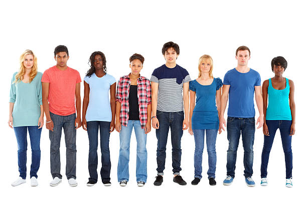 istock Multi-ethnic group of teenagers stand in a row 472149311