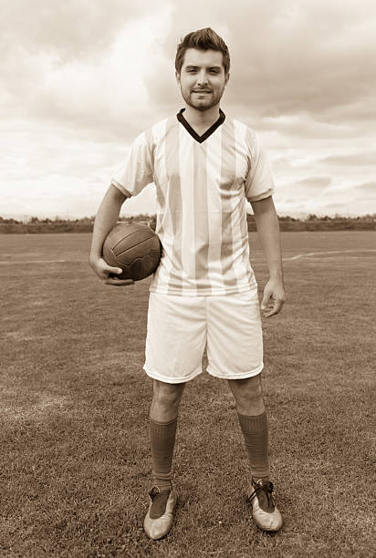 istock Vintage football player 472149827