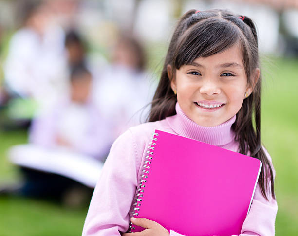 istock Happy school girl 472149915
