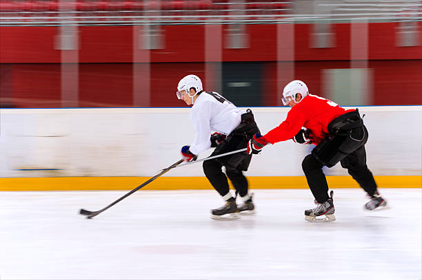 istock Two Ice Hockey Players in Fast Action 472150129