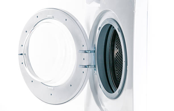 Washing machine with an open door detail stock photo