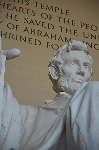 Abraham Lincoln Sculpture Left Corner Close up Lincoln Memorial Washington, DC, USA  April 18, 2015 - Abraham Lincoln sculpture close-up view from left corner. Ambient daylight, as-shot, no editing. washington dc slavery the mall lincoln memorial stock pictures, royalty-free photos & images