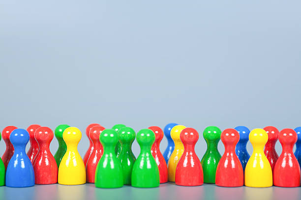 istock Many Ludo Figures in a row 472152824