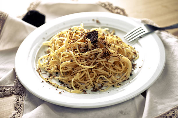 Spaghetti with truffles Spaghetti with truffles tartuffo stock pictures, royalty-free photos & images