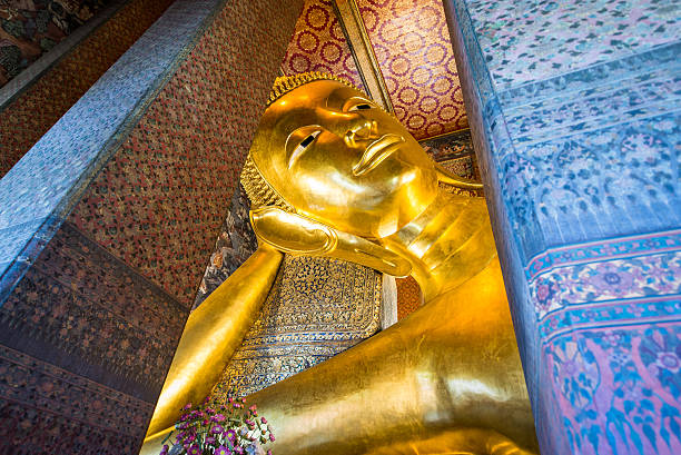 istock Giant Buddha inside Wat Pho Temple, bangkok, Thailand. 472155234