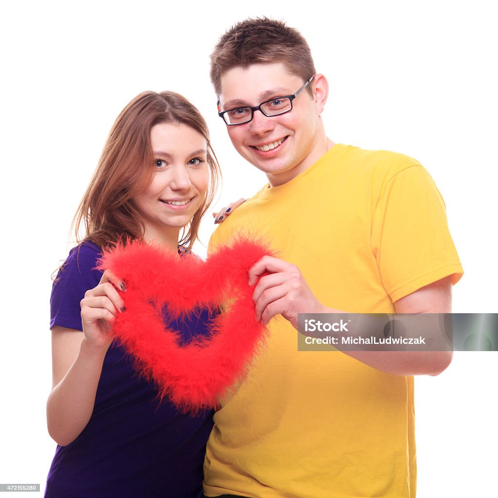 Young people in love holding symbol of love Young people in love holding heart 2015 Stock Photo