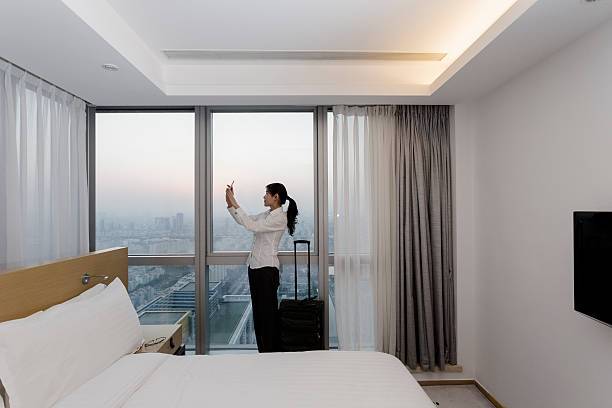 istock businesswoman in hotel 472155721