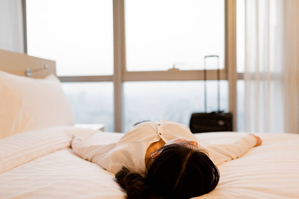 istock businesswoman in hotel 472155733