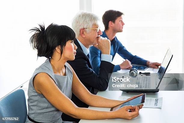 Business People In Education Room Listening Lectureworking With Computers Stock Photo - Download Image Now