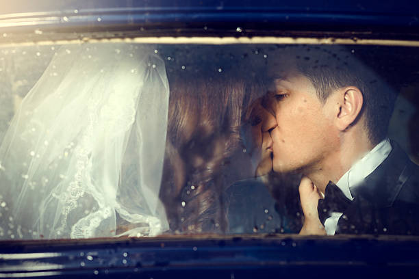 istock retro grooms kissing 472156097