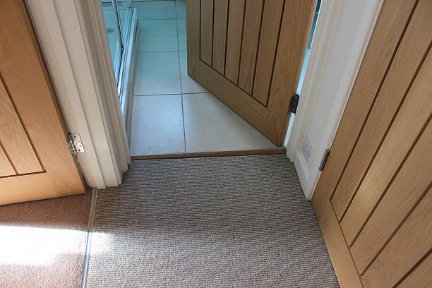 istock Image of three internal hardwood doors, different floors, carpet, tiles 472156350